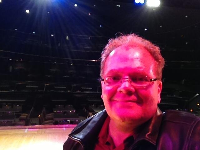 hypnotist Chris Cady on stage prior to a hypnosis show